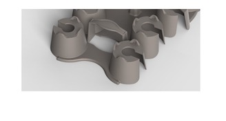 ArmCaddy CAD render — close 3/4 view showing the 9-well deck and bicep cradle