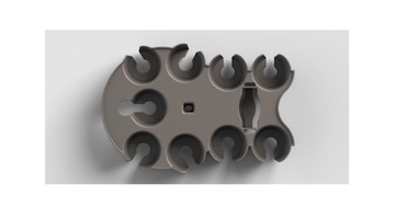 ArmCaddy CAD render — top-down view showing the C-slot wells and keyhole hand-grip